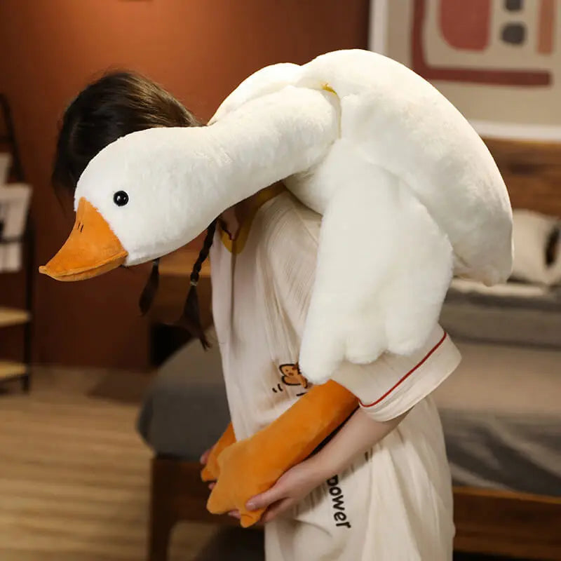この巨大なガチョウの形をしたクッションぬいぐるみで、優しいひとときをお楽しみください。