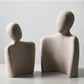 Sculpture moderne symbolisant lien et tendresse