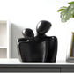 Sculpture moderne symbolisant lien et tendresse